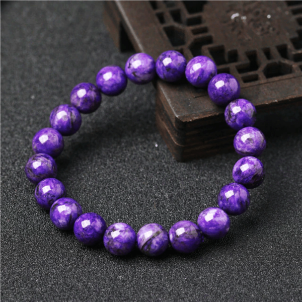 Bracelet en pierre énergétique charoïte mauve